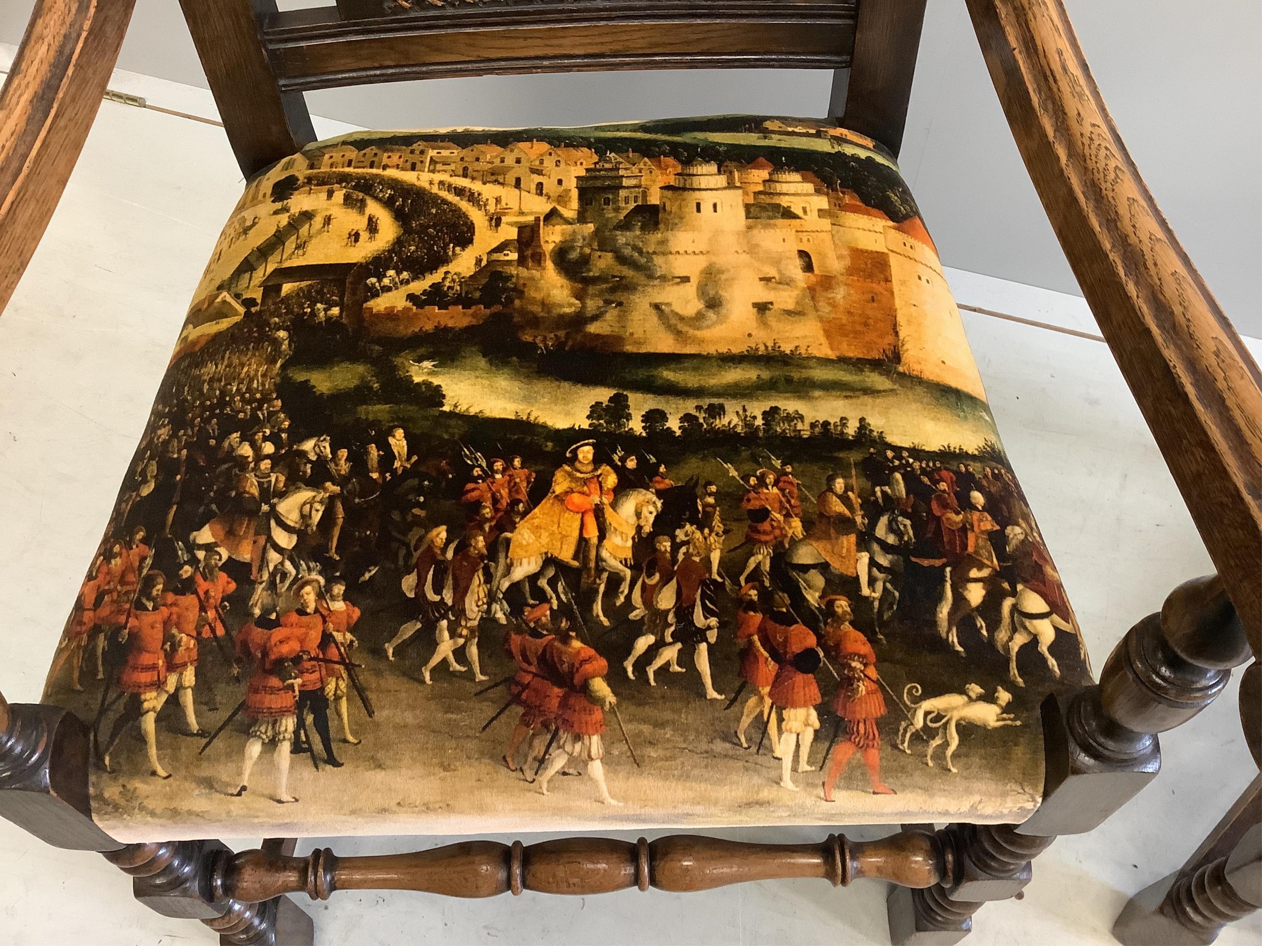 An 18th century style rectangular oak draw leaf refectory dining table, width 244cm extended, depth 85cm, height 79cm together with seven caned oak dining chairs, two with arms. Condition - fair to good